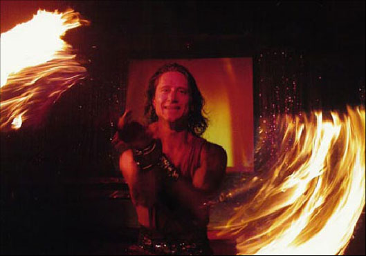 Fire act: fire breathing, fire eating, spinning