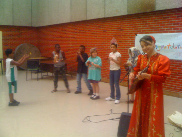 Russian multicultural school assembly. Ensemble Barynya from New York