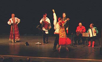 Russian folk duo "Misha and Natasha from Russia" and Russian folk dancer Alexandre performing Don Cossack's song and dance "By the field". Movie file Oi_Pri_Luzhke.mpeg 4345860 KB 